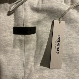 ESSENTIALS Fear of God Light Gray pants with tags